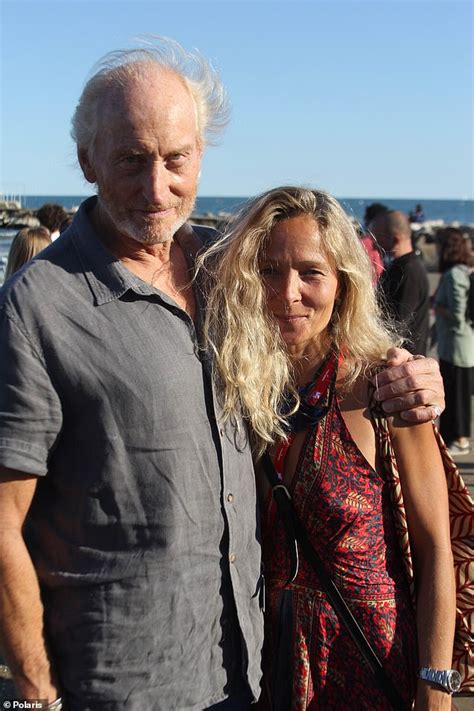 Charles Dance, 73, cosies up to Italian girlfriend  .